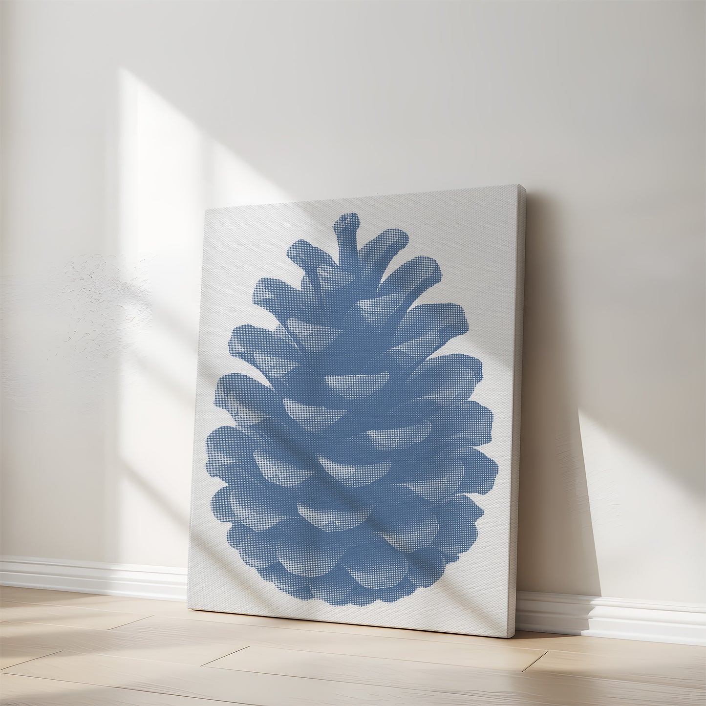 Blåt minimalistisk koglemotiv trykt på lærred.