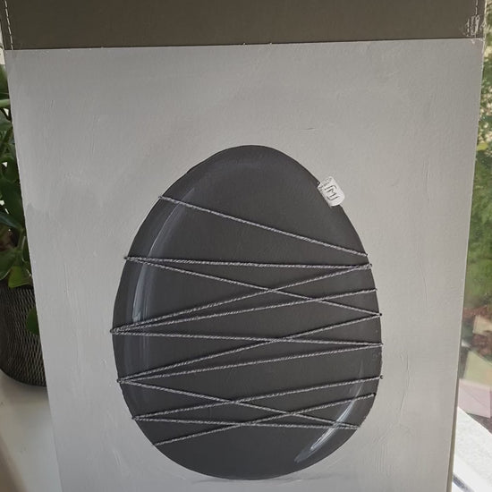 Moderne minimalistisk kunst med struktur og snor detalje