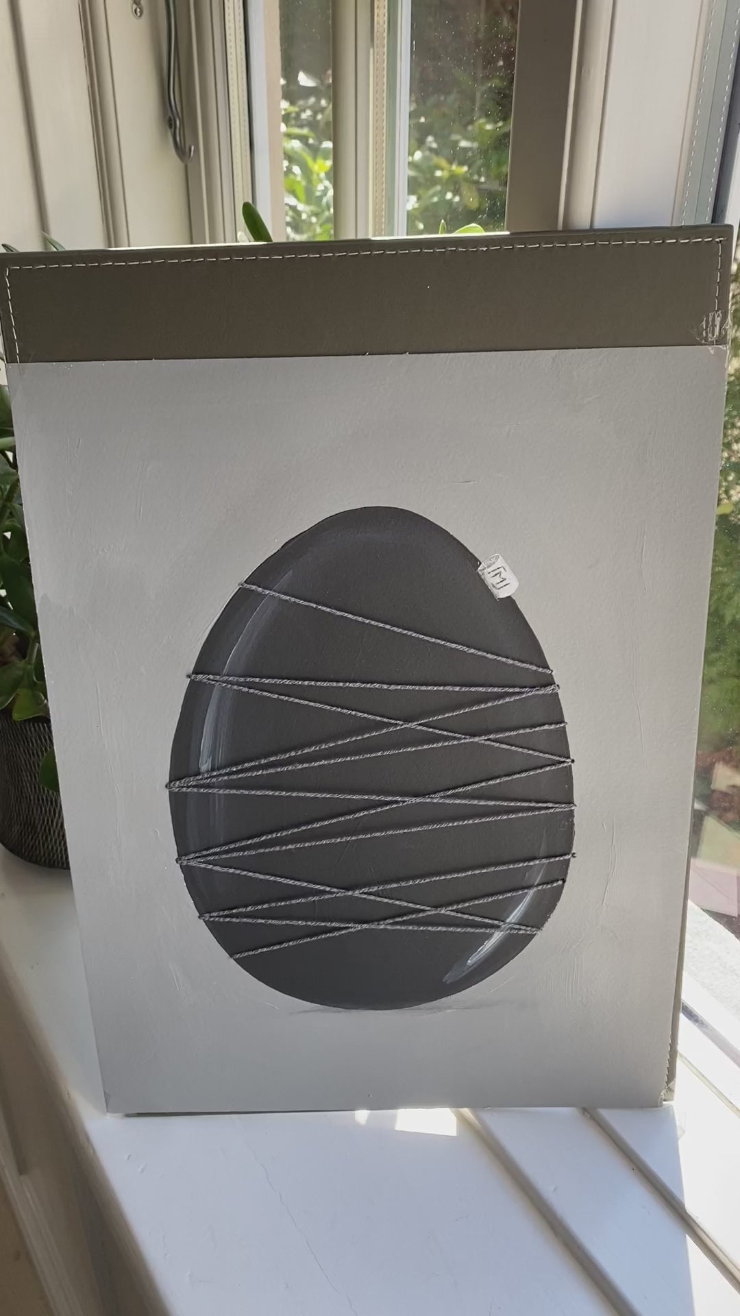Moderne minimalistisk kunst med struktur og snor detalje
